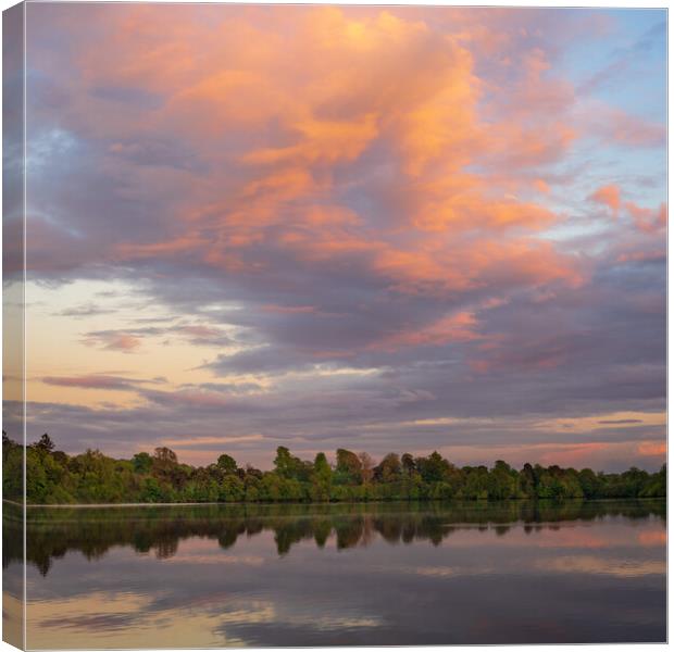 View across the Ellesmere Mere to a clear reflection of distant  Canvas Print by Steve Heap