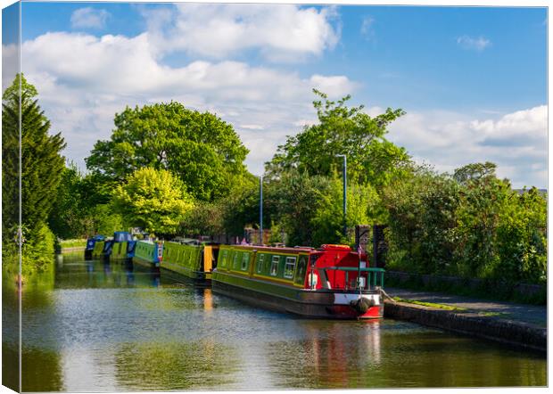 Colorful canal narrowboats in Ellesmere in Shropsh Canvas Print by Steve Heap