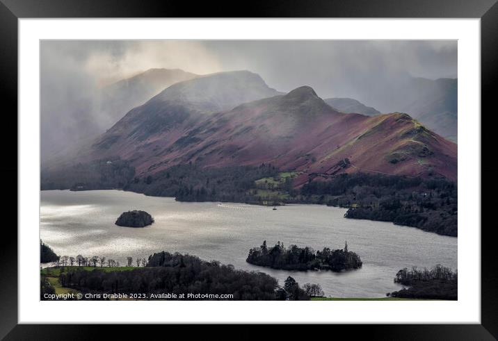 Catbells under storm clouds Framed Mounted Print by Chris Drabble