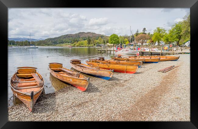 Wooden rowing boats on the shores at Ambleside Framed Print by Jason Wells