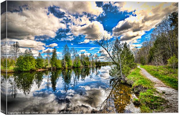Serene Reflections: A Tranquil Spring Journey Canvas Print by Ken Oliver