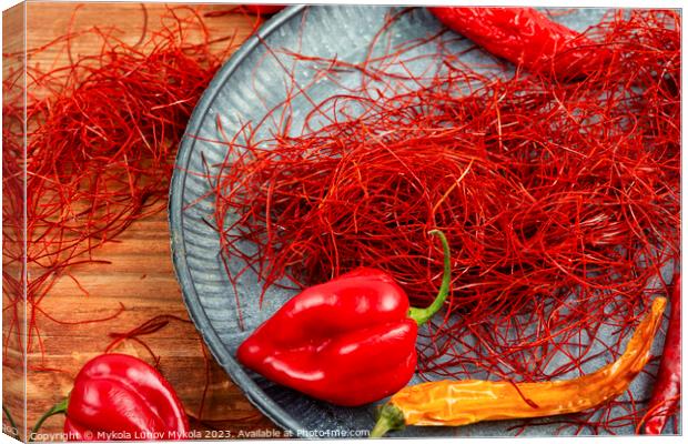 Hot red pepper spice. Canvas Print by Mykola Lunov Mykola