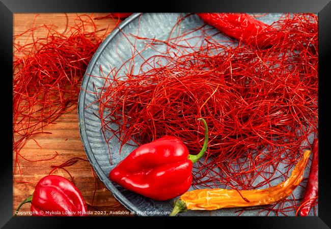 Hot red pepper spice. Framed Print by Mykola Lunov Mykola