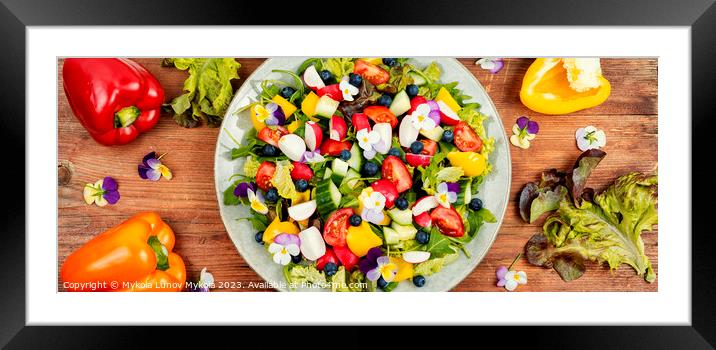 Edible flowers salad in a plate. Framed Mounted Print by Mykola Lunov Mykola