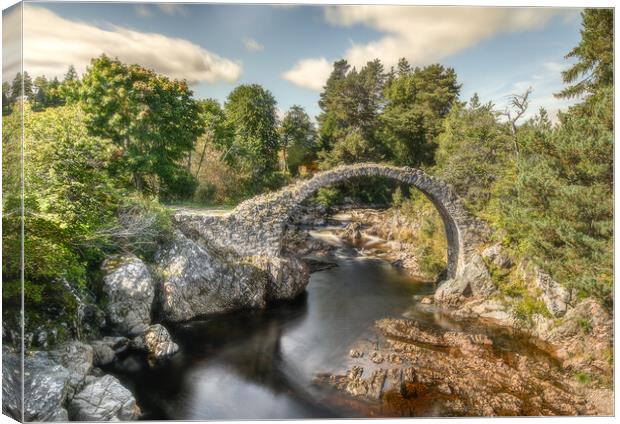 The Enchanting Carrbridge Stone Bridge Canvas Print by Duncan Loraine