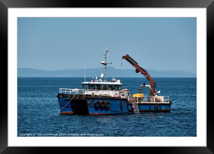 Boat off Burghead shore Framed Mounted Print by Tom McPherson