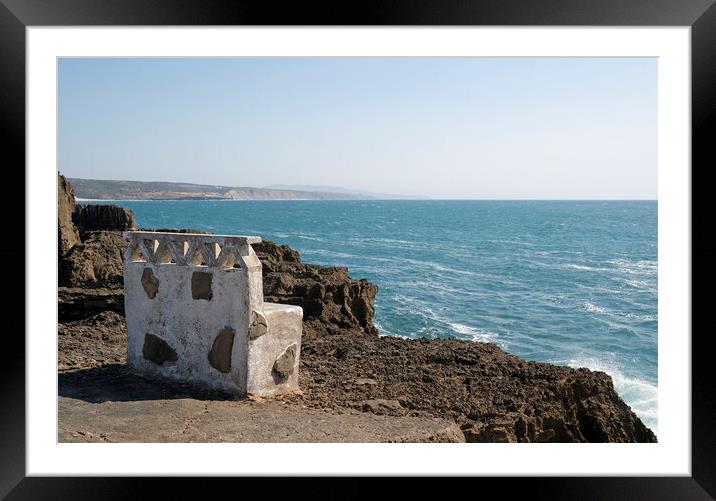 Concrete bench with a beautiful ocean view Framed Mounted Print by Lensw0rld 