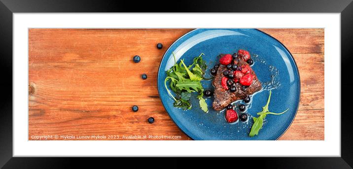 Beef steak in berry sauce on plate. Framed Mounted Print by Mykola Lunov Mykola