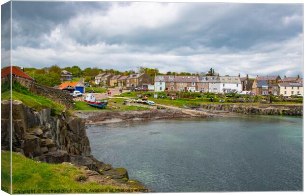 Storm Clouds over Craster Village Canvas Print by Michael Birch