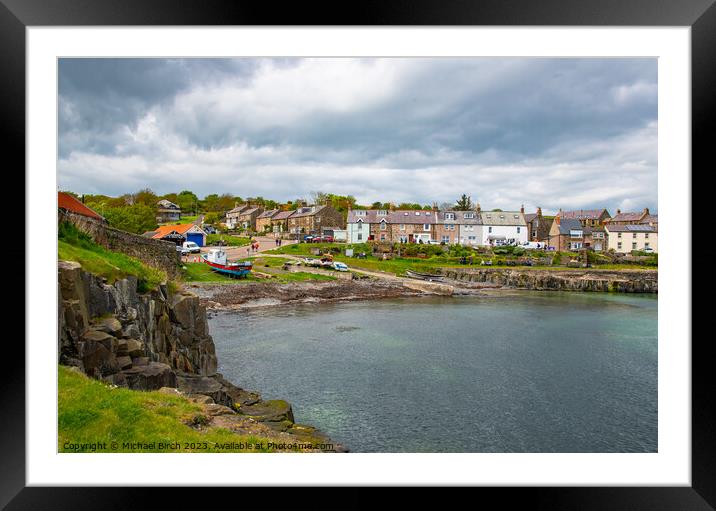 Storm Clouds over Craster Village Framed Mounted Print by Michael Birch