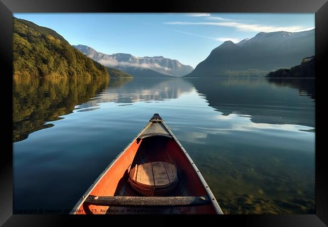 The morning mist cools the calm lake on which a lone canoe float Framed Print by Joaquin Corbalan