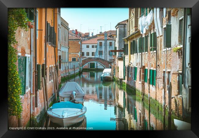 Narrow water canals in Venice. Framed Print by Cristi Croitoru