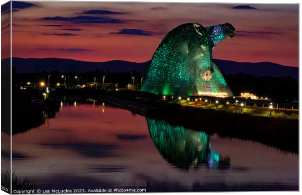 The Kelpies green lights at Night Canvas Print by Les McLuckie