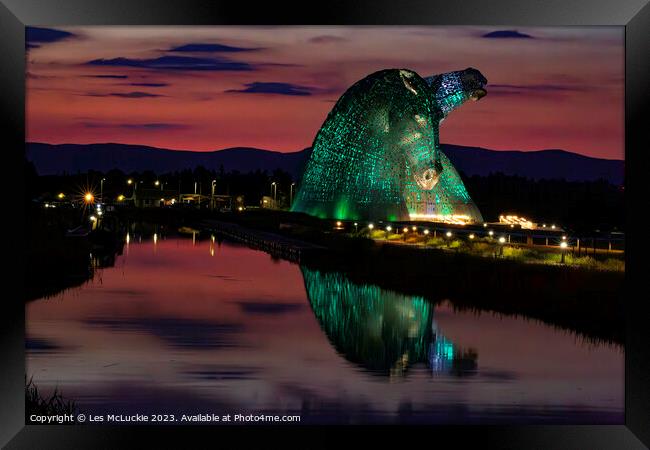The Kelpies green lights at Night Framed Print by Les McLuckie