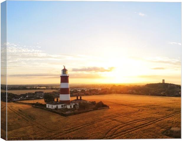 Happisburgh Lighthouse at Sunset Canvas Print by Chris Spalton