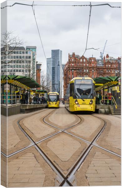 Trams in St Peters Square Canvas Print by Jason Wells