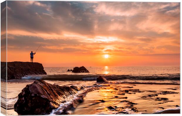 Widemouth bay sunset with lone fisherman Canvas Print by Maggie McCall