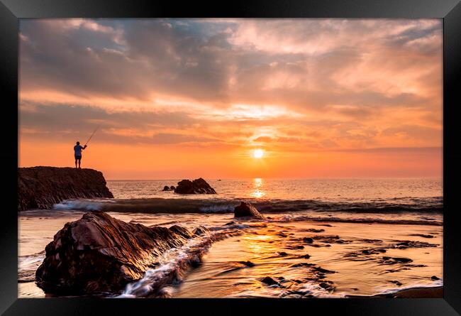 Widemouth bay sunset with lone fisherman Framed Print by Maggie McCall