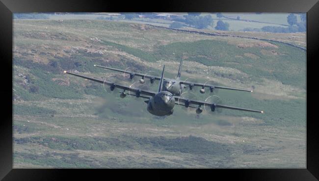 Two RAF Hercules entering the Mach Loop Framed Print by Rory Trappe