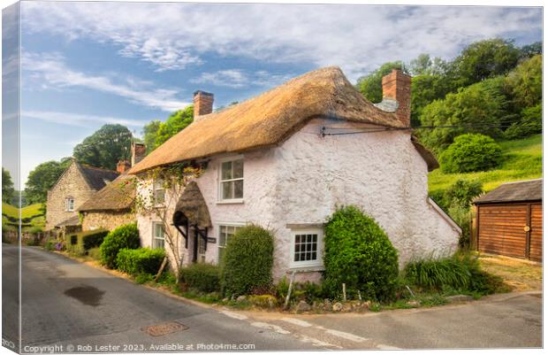 Charming Thatched Cottage in Rural Branscombe Canvas Print by Rob Lester