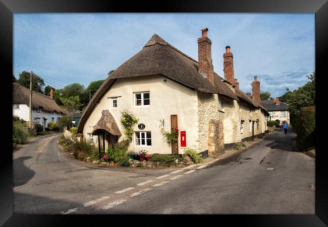Tranquil Thatched Cottage in Branscombe Framed Print by Rob Lester