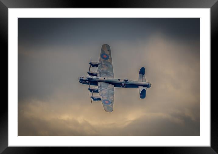 Lancaster Bomber turns back towards  Framed Mounted Print by Jonny Gios
