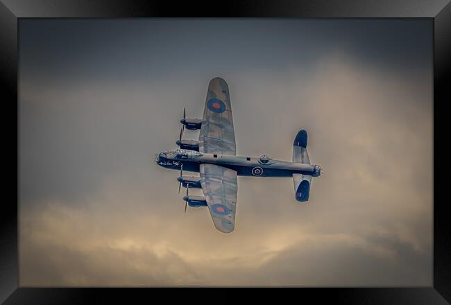Lancaster Bomber turns back towards  Framed Print by Jonny Gios