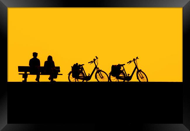 Resting Cyclists at Sunset Framed Print by Arterra 