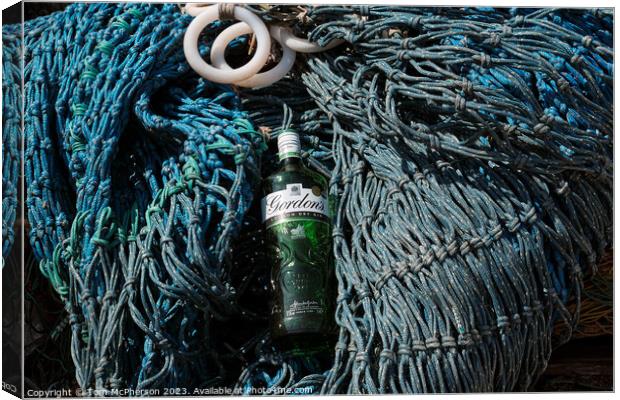 Abstract Gin bottle on fishing nets Canvas Print by Tom McPherson