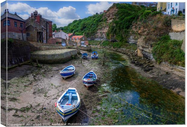 Staithes Harbour at low tide Canvas Print by Paul Grubb