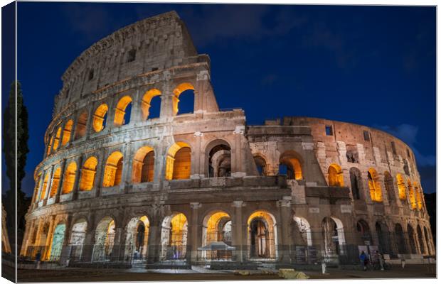 Colosseum at Night in Rome Canvas Print by Artur Bogacki