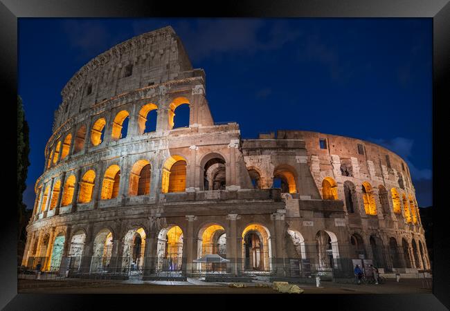 Colosseum at Night in Rome Framed Print by Artur Bogacki