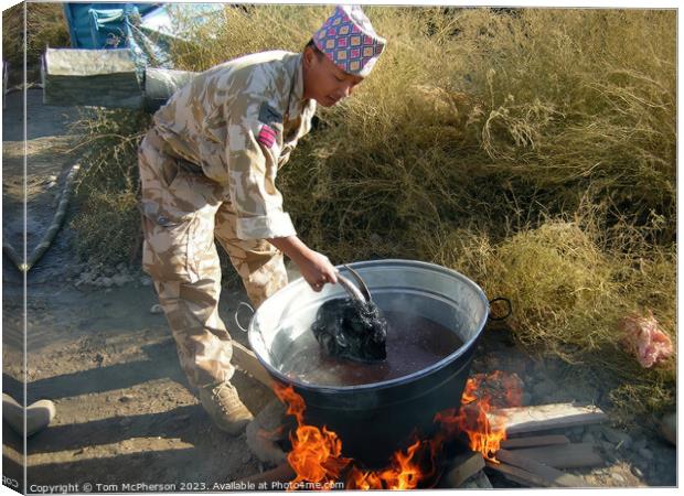 Gurkha prepares Goats Head Soup Canvas Print by Tom McPherson