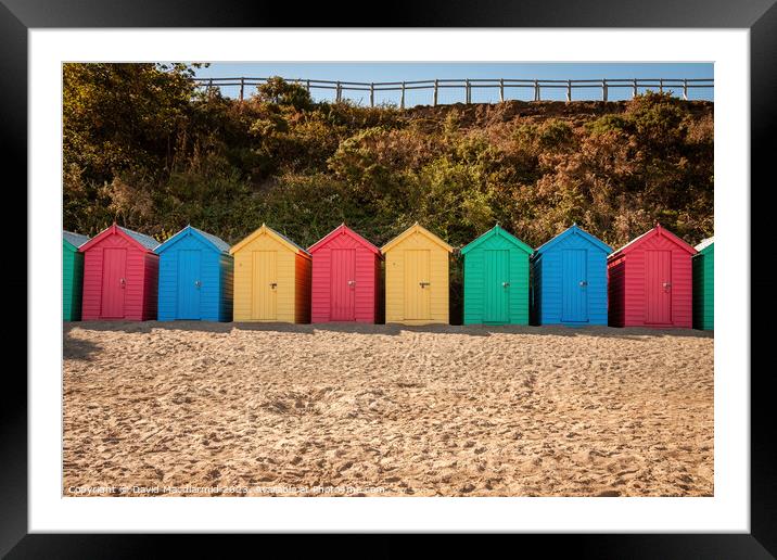 Colourful beach huts at Llanbedrog Beach Framed Mounted Print by David Macdiarmid