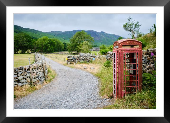 Distressed phone box Framed Mounted Print by Kevin Ainslie
