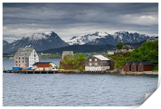 Wooden Buildings and Mountains in Alesund Norway Print by Martyn Arnold