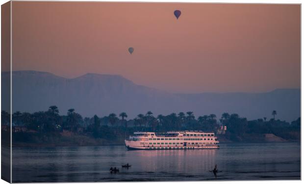 Sunrise at Luxor on the River Nile Canvas Print by John Frid