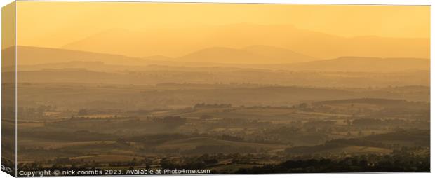 Golden Hues Over Rolling Countryside Canvas Print by nick coombs