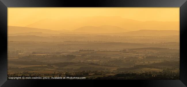 Golden Hues Over Rolling Countryside Framed Print by nick coombs