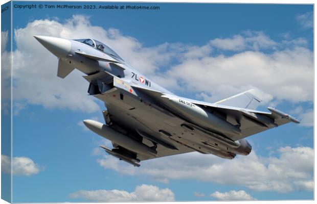 "Effortless Grace: A Fighter Jet Pierces the Cloud Canvas Print by Tom McPherson