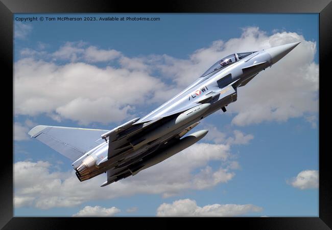 Graceful Fighter Jet Piercing the Clouds Framed Print by Tom McPherson