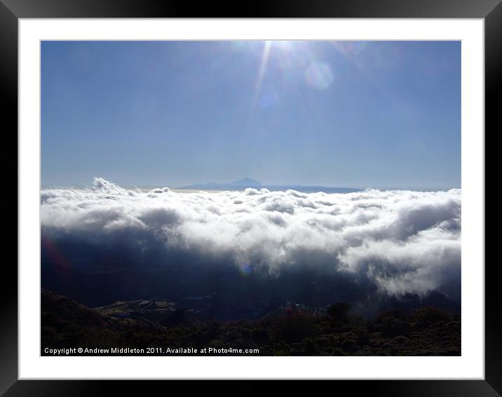 View Between The Cloud Framed Mounted Print by Andrew Middleton