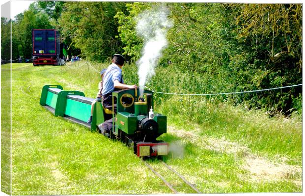 "Enchanting Miniature Steam Train Adventure" Canvas Print by john hill