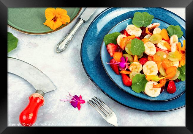 Colorful fruit salad with nasturtium. Framed Print by Mykola Lunov Mykola