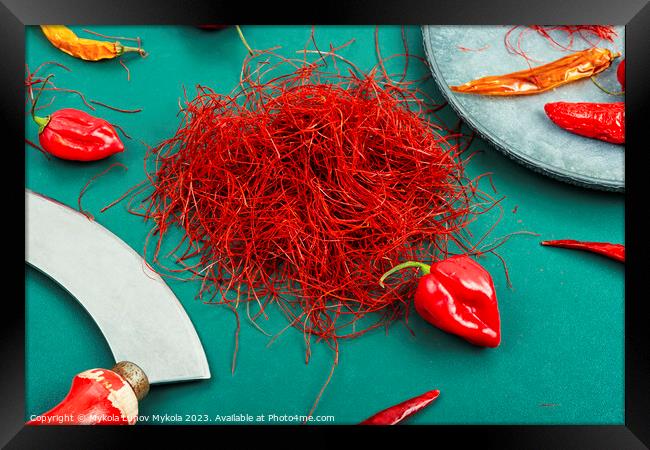 Hot red pepper spice. Framed Print by Mykola Lunov Mykola
