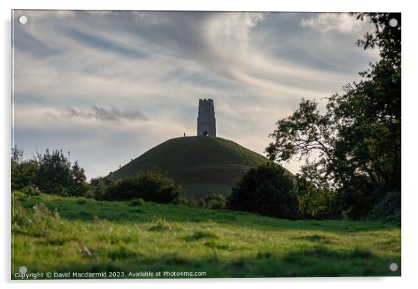 A large green field with trees in the background with Glastonbury Tor in the background Acrylic by David Macdiarmid