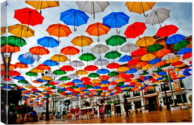 Vibrant Umbrella Haven in Torrox Canvas Print by Andy Evans Photos