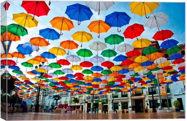 Vibrant Umbrella Canopy in Torrox Canvas Print by Andy Evans Photos