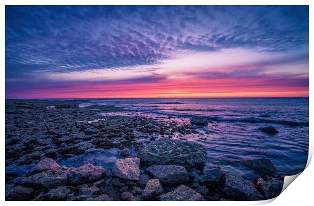 Tranquil Sunset Reflection on Rocky Shore Print by Jonny Gios