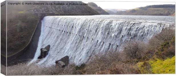 Caban Coch dam in full flow Canvas Print by Mark Chesters